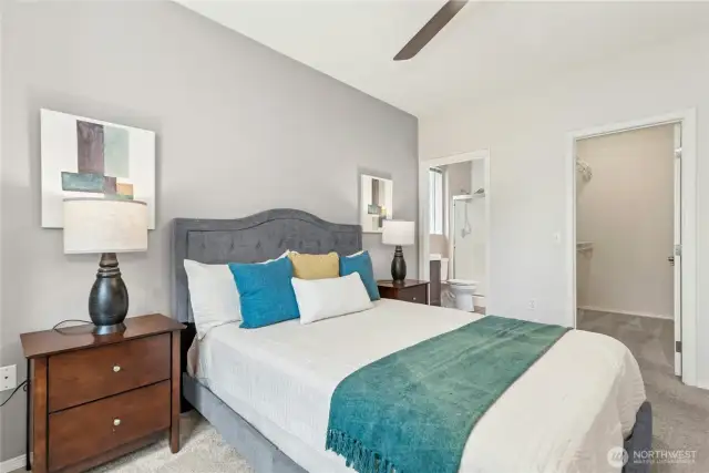 Primary bedroom includes 3/4 shower and walk-in closet.