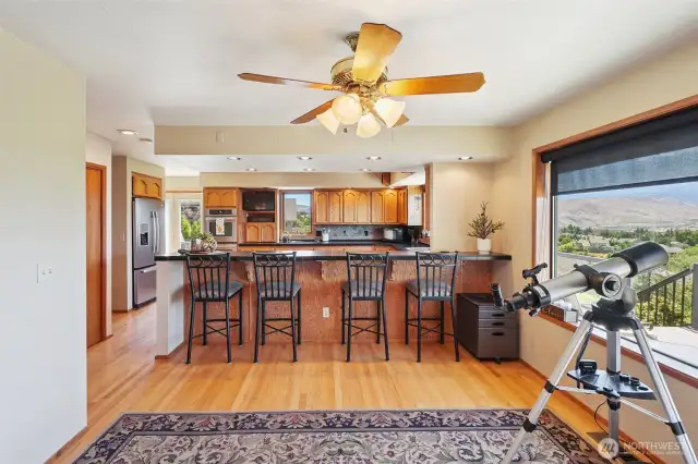 peninsula seating in kitchen- original hardwood floors in many areas on main floor