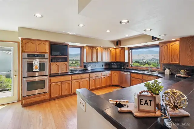 Classy kitchen with access to wrap around deck- perfect BBQ placement