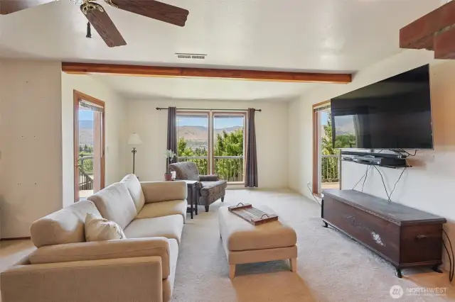 Lower-level family room with access to 2nd level wrap around deck