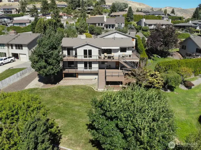 RV parking on side of home in rear yard- and room for a pool!