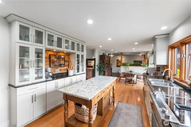 Oversized built-in buffet with under-cabinet lighting perfect for showing off your favorite dishes and décor.