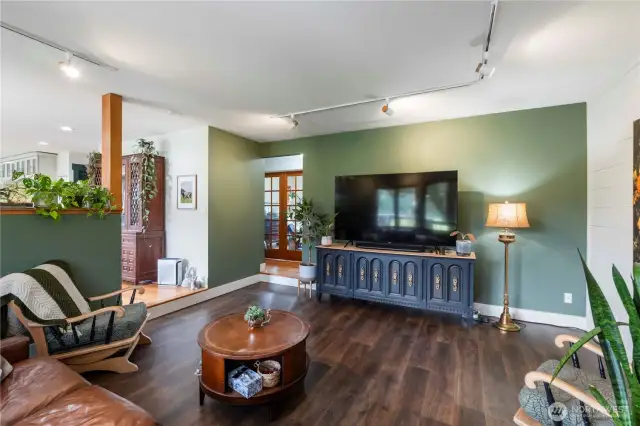 Another view of the living room showing the office straight ahead. Stay comfortable and save money year-round with the heat pump with A/C.
