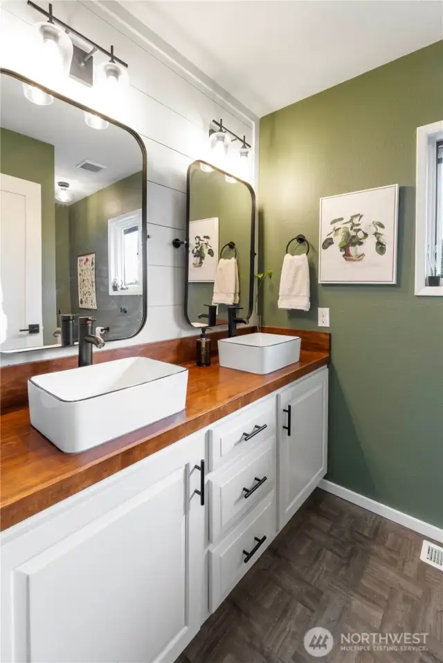 Another full bathroom conveniently located just across from the 3rd bedroom upstairs.