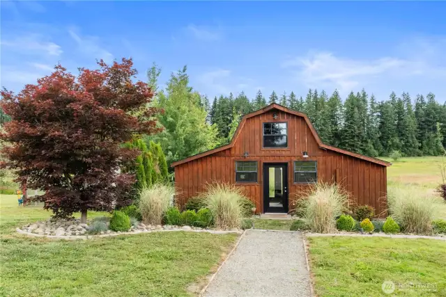 The smaller barn is fully insulated and finished, currently used as an office with ductless HVAC and a private deck. Originally designed to be a bridal suite.