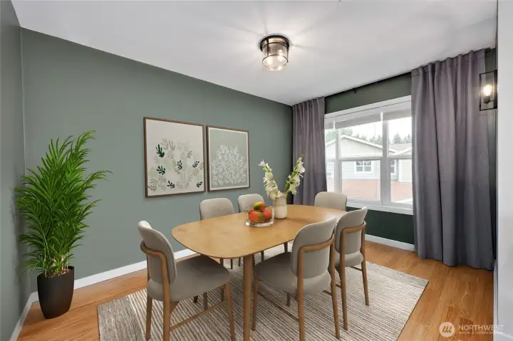 Digitally staged as an alternative to show dining room options.