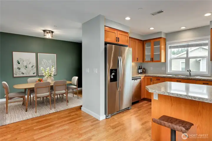 Digitally staged as an alternative to show dining room options.