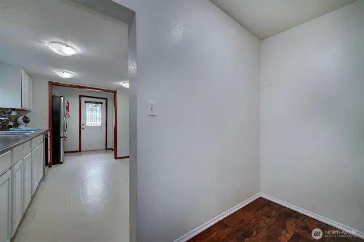 Off living room desk nook to the right.