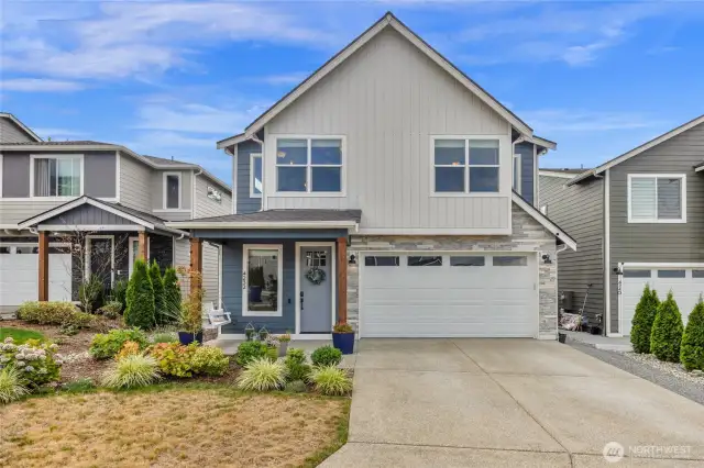 Front of home with extended driveway