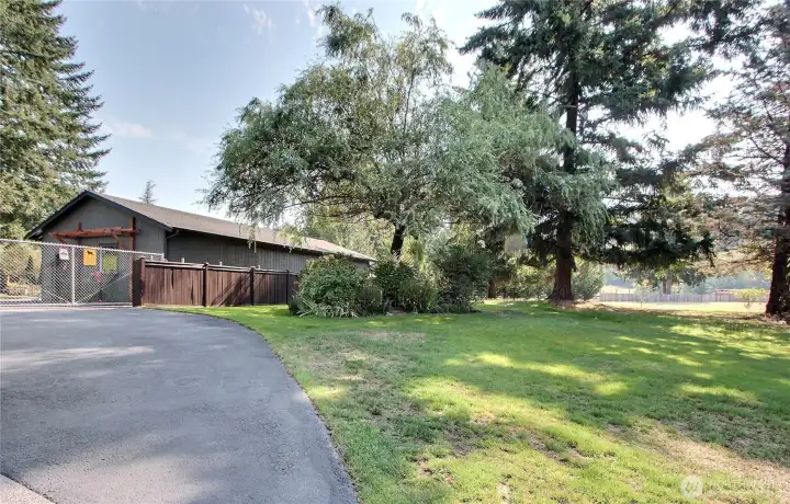 Another view of Garage and landscaping