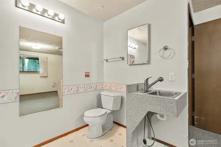 wheelchair accessible bathroom in primary bedroom