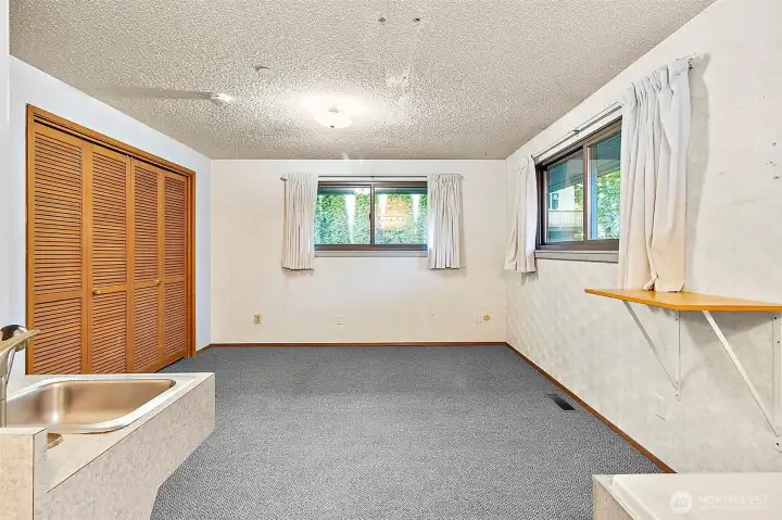 looking out into primary bedroom from bathroom area