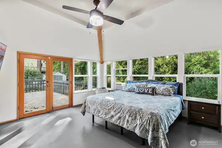 French doors take you from sunroom out to large backdeck