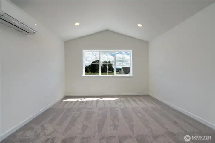 Upstairs Primary Bedroom - Features and colors may differ.