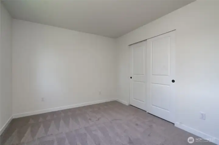 Upstairs Guest Bedroom - Features and colors may differ.