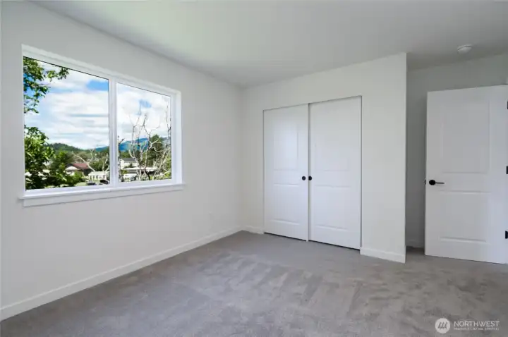 Upstairs Guest Bedroom - Features and colors may differ.