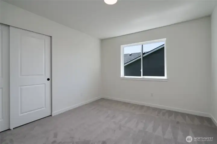 Upstairs Guest Bedroom - Features and colors may differ.