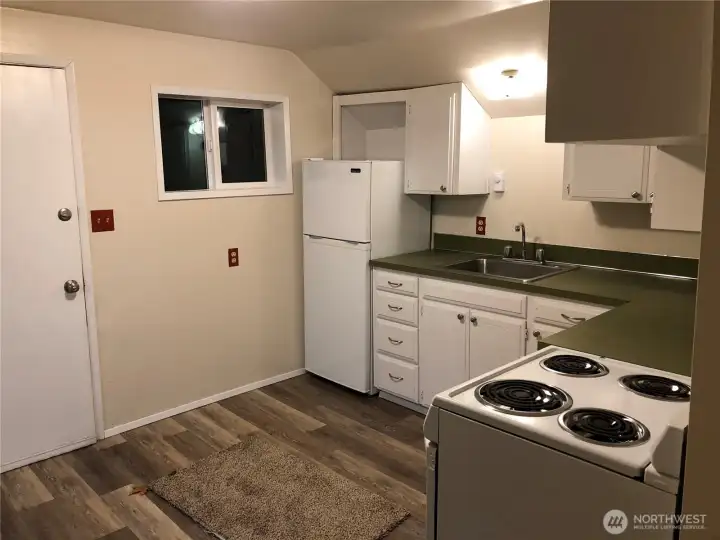 Upper Unit Kitchen and Entry Door