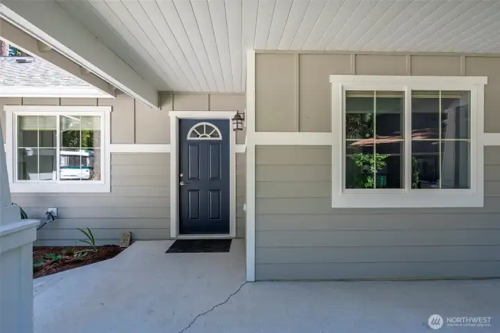 Tongue and groove ceiling is an elegant entryway! The cement plank siding makes this house low maintenance.
