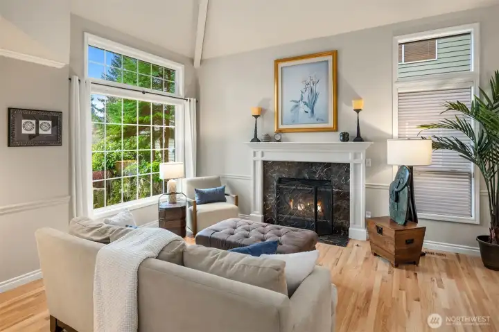 Relax in the formal living room with gas burning fireplace.