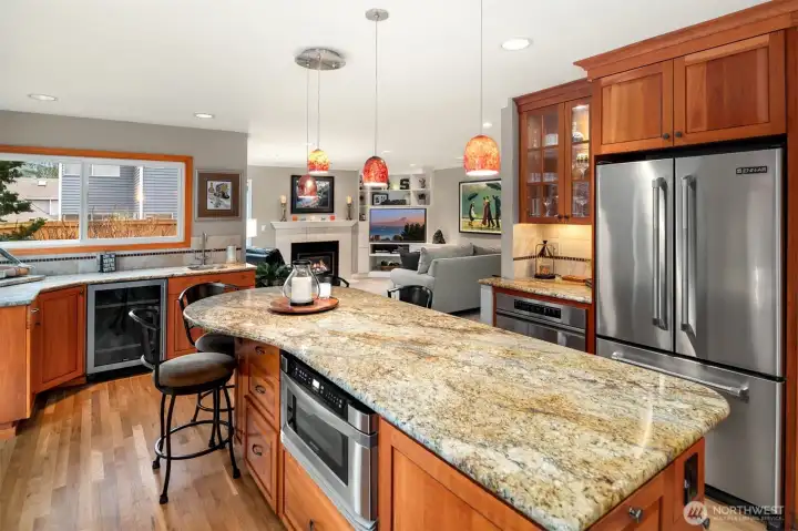 Note the drawer microwave in the island and beverage fridge