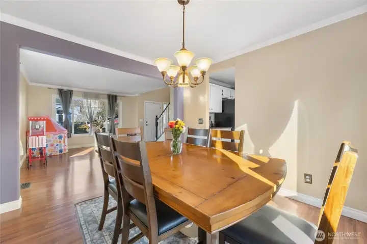 Large dining room with lots of natural light opens to 2nd living room