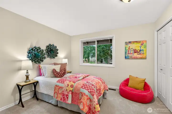 Another secondary bedroom is well sized and versatile, ready to adapt to changing needs over time. The simple layout and good natural light make it easy to use as a bedroom, office, or study space.