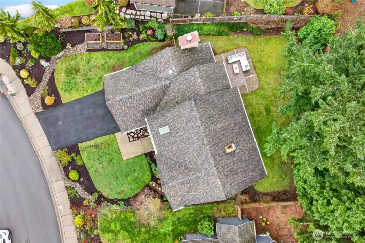 The aerial view showcases the home’s position within Olde Morrison Place, with mature landscaping, a private backyard, and the new driveway helping define the property’s curb appeal. It also gives buyers a strong sense of the lot, neighborhood setting, and established English Hill surroundings.