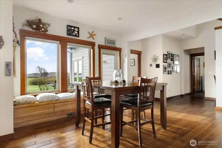 Dining area - doors to deck, primary bedroom and laundry room