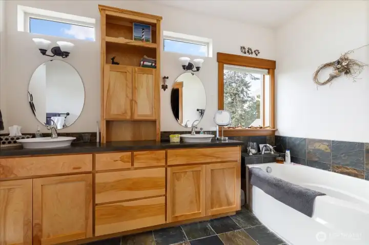 Primary bathroom (full bath) showing soaking tub.