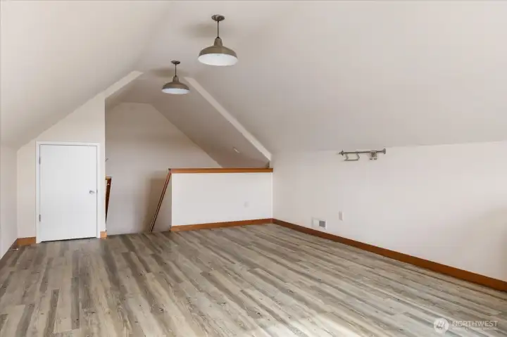 Upper Loft bonus room with Dutch attic for storage.