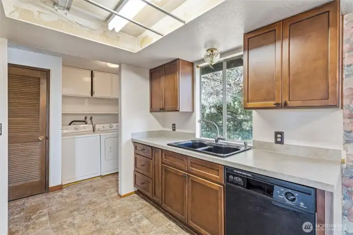 Kitchen is spacious and bright.