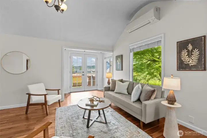 Open layout with rounded vaulted ceilings create a warm, inviting space.