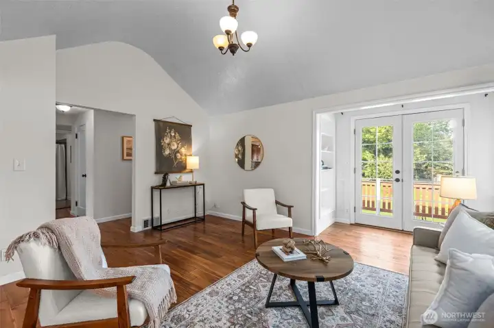 Newer french doors, built ins, and warm tones will have you falling in love with this character filled home.