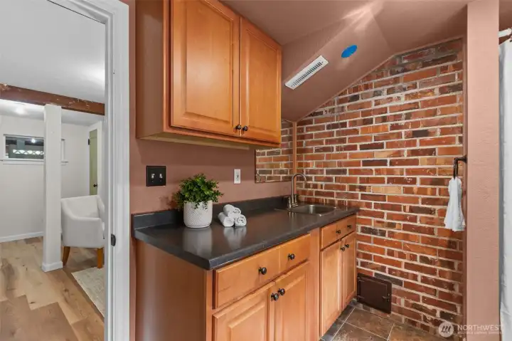 Exposed brick wall - love this touch or character.