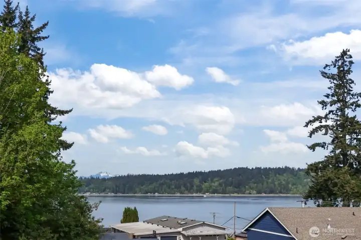 Peek a boo views over sinclair inlet and of the Olympic Mts.