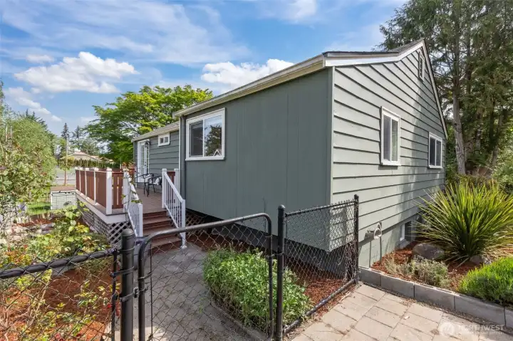 Fully fenced pasture, and a partially fenced side yard!