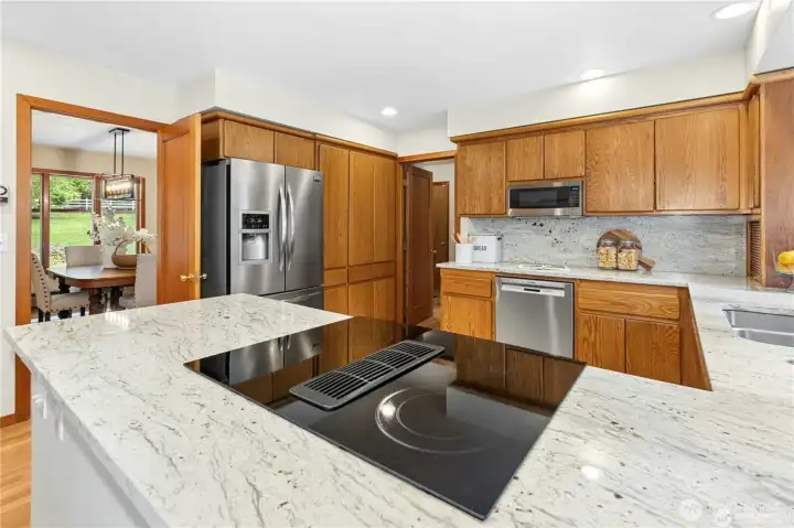 Dining room, Powder room, Laundry and 3 car garage just off kitchen