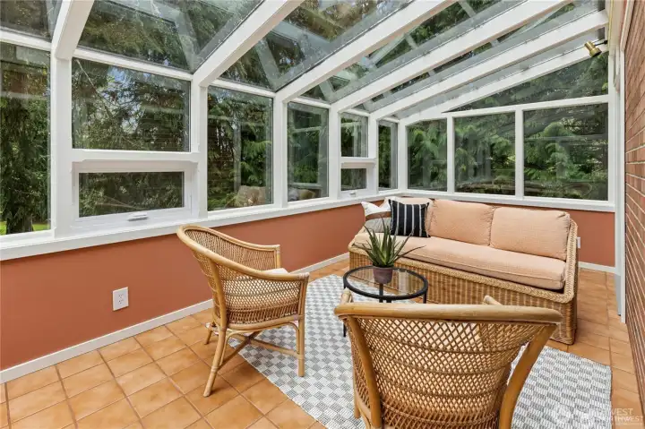 Sun room just off the den with a door that lead to the large patio