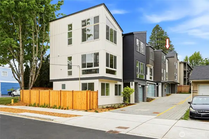 From left to right: 1516 NE 147th Street, 1512 NE 147th Street and 1508 NE 147th Street (furtherest off the street)