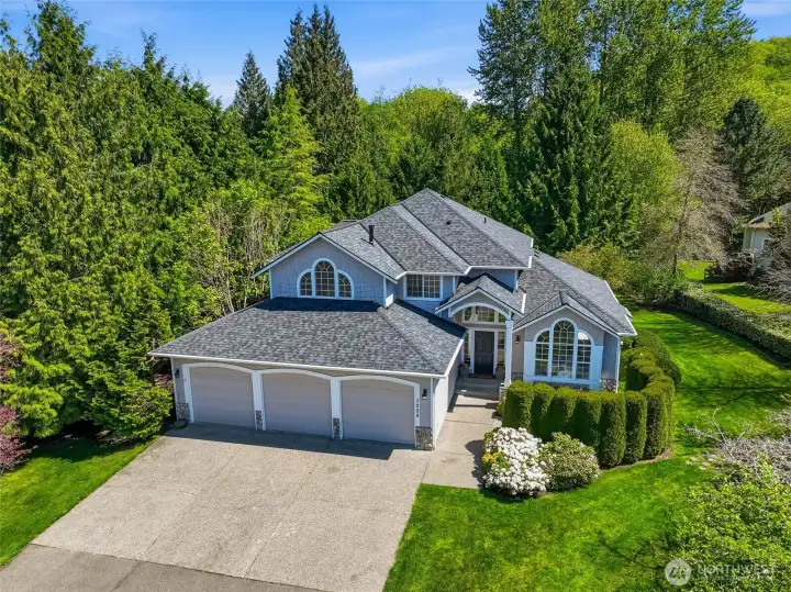Highlights of home include a new roof, downspouts and LeafGuard gutters. Spacious 3 car garage, extra driveway parking, and true pride of ownership