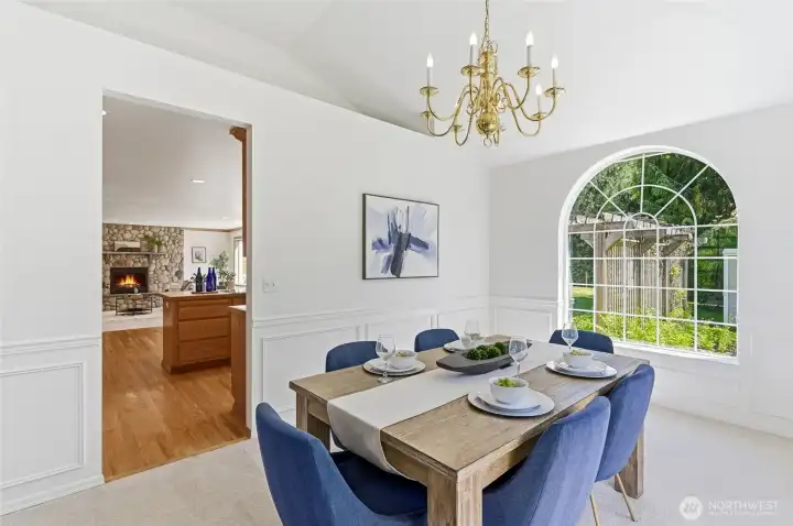 Architecturally unique, oversized windows enhance the space by bringing in natural light and outdoor views.