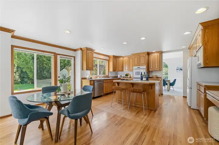 Enjoy the lovely private backyard views while in the kitchen dining area.