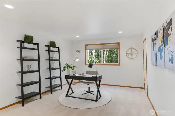 Large, versatile main floor office space with dual closets provides flexibility and can be used as a 5th bedroom.