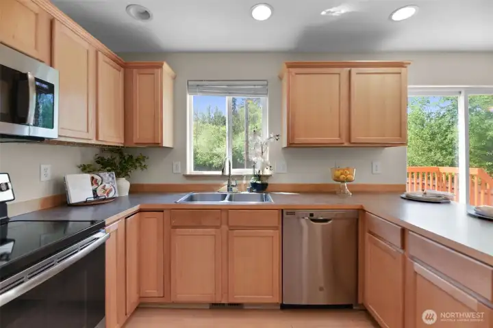 Kitchen with window looking over back yard