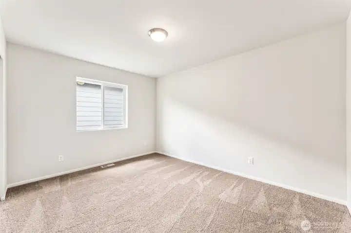 Bed #2-Disclaimer- Photos are from a similar floor plan from another community, photos are for illustrative purposes only. Finishes, flooring, features, upgrades, countertops, paint, colors, and other features may vary.