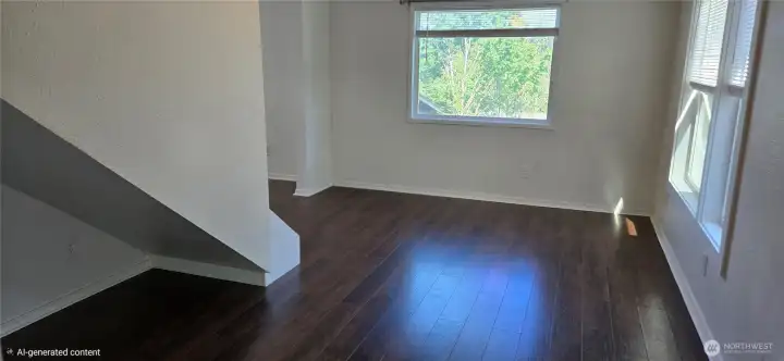 Living room with ample windows