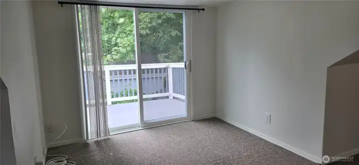 Upstairs main room with deck