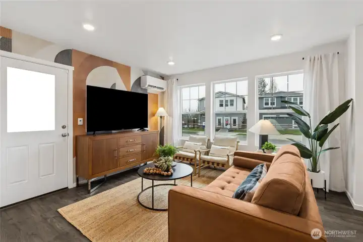 “Abundant natural light fills the main living space.” “Abundant natural light fills the main living space.”