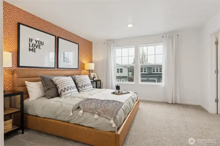 “Large windows provide natural light in the primary retreat.” “Large windows provide natural light in the primary retreat.”